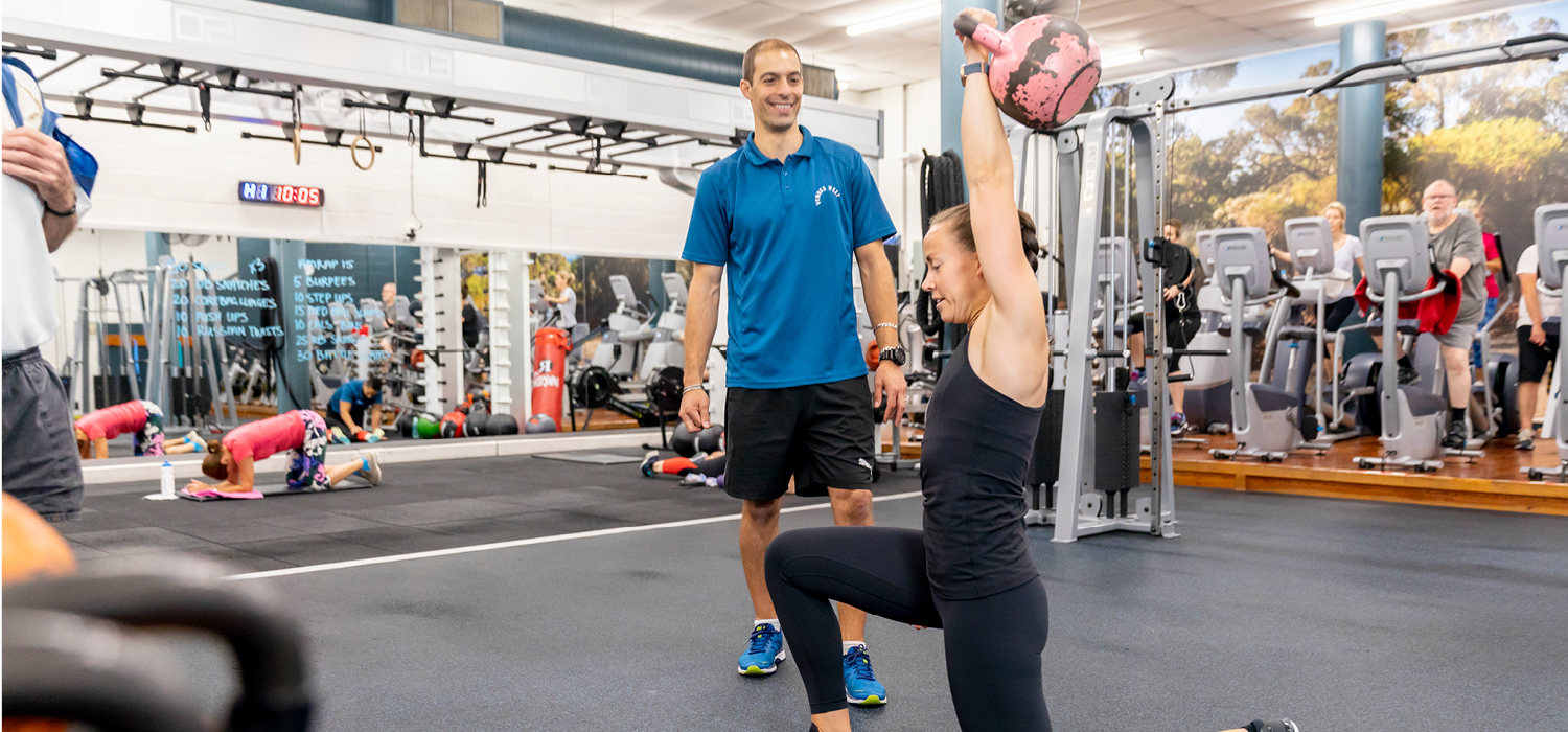 lady working out with kettlebell