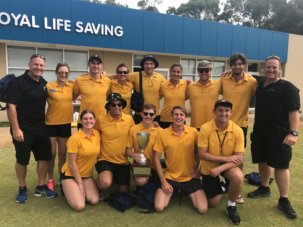 team photo with a trophy