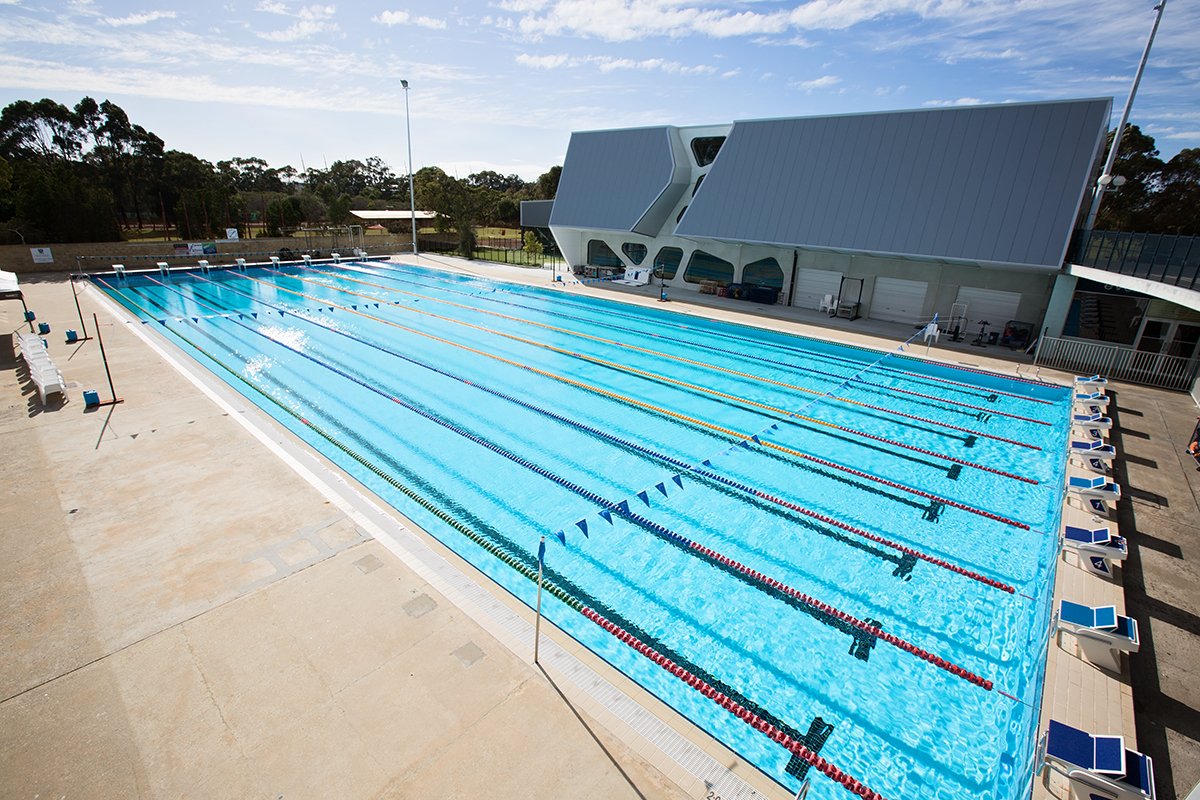 HBF Stadium outdoor 8 lane pool with WAIS in the background