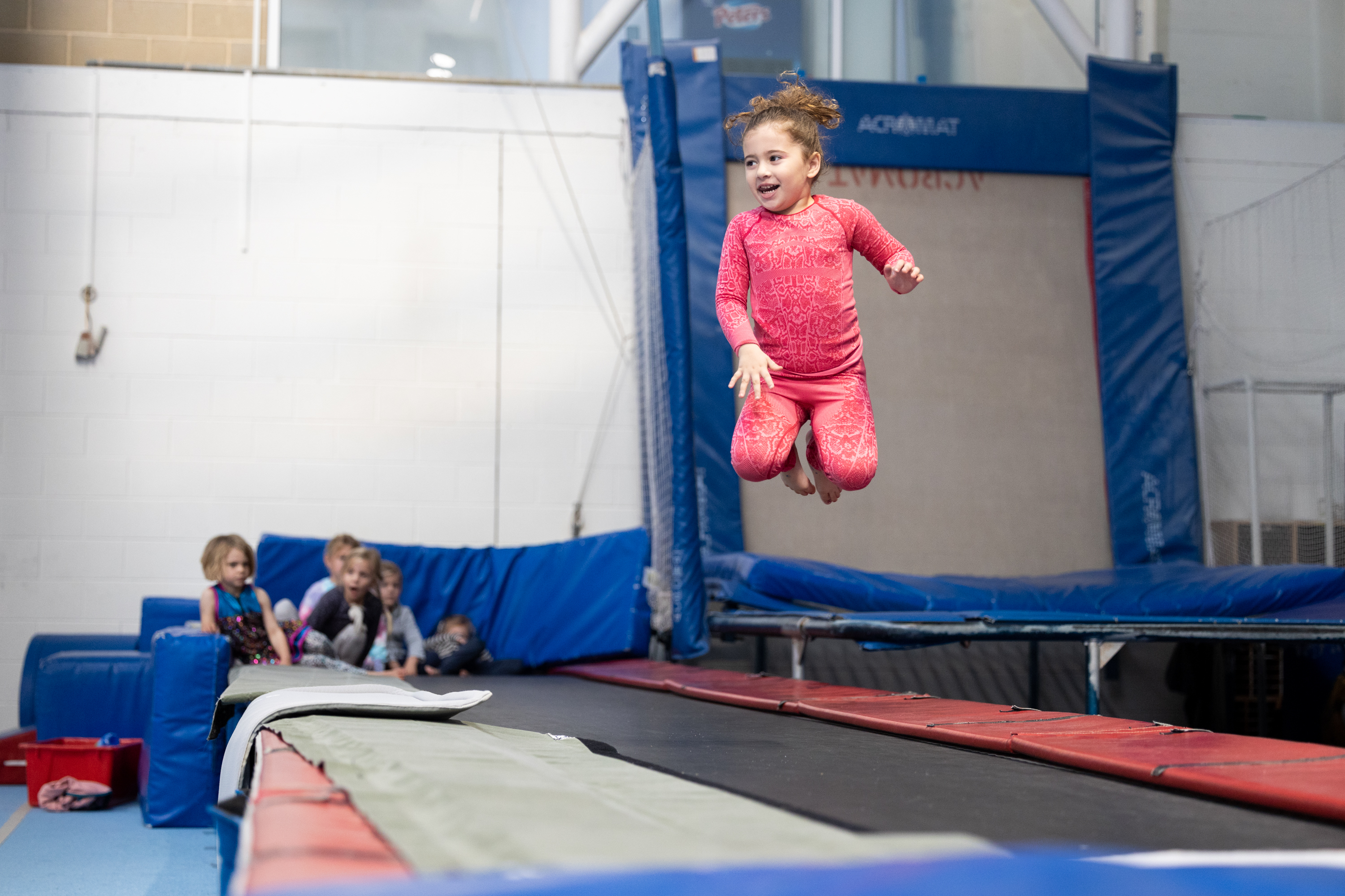Young girl jumping on trampoline in HBF Stadium gymnastics training centre