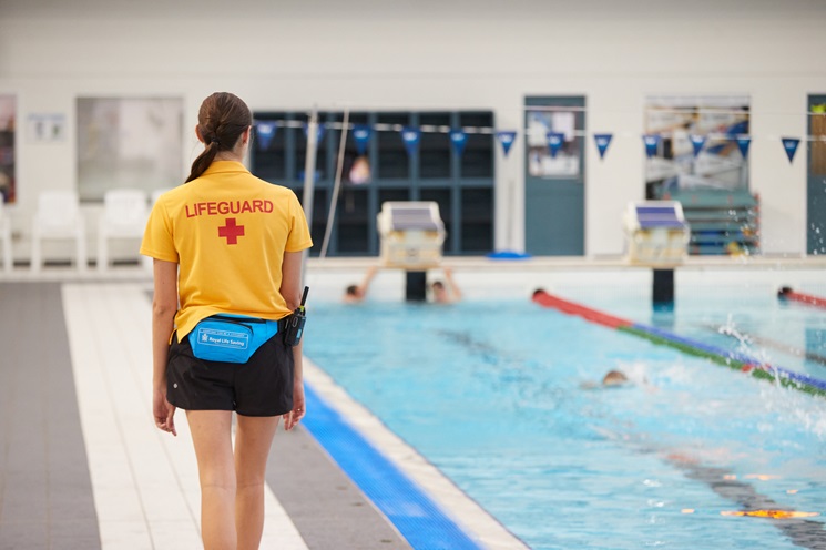 HBF Stadium lifeguard patrolling the indoor 8 lane pool