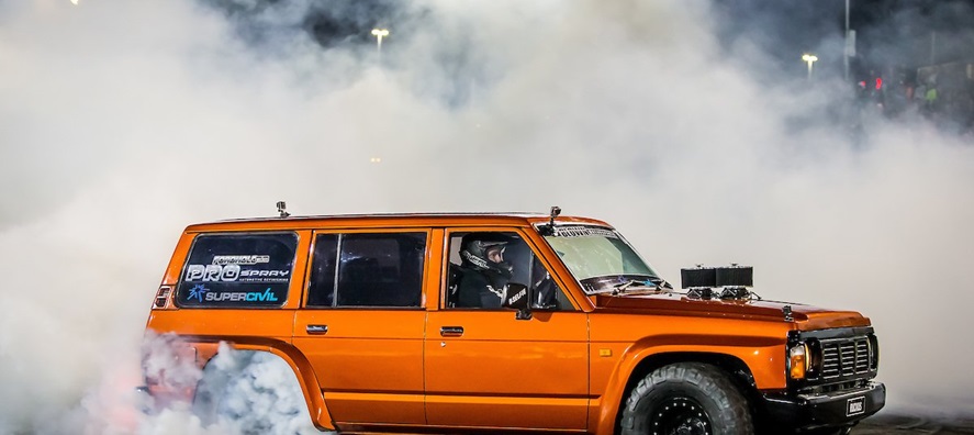 A photo of a car creating a cloud of smoke as part of the Whoop Ass Wednesday event at the Perth Motorplex in Kwinana, Perth