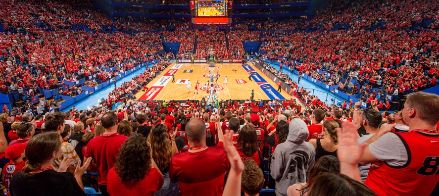A photo taken from the crowd of a Perth Wildcats game being played on the court at RAC Arena in Perth