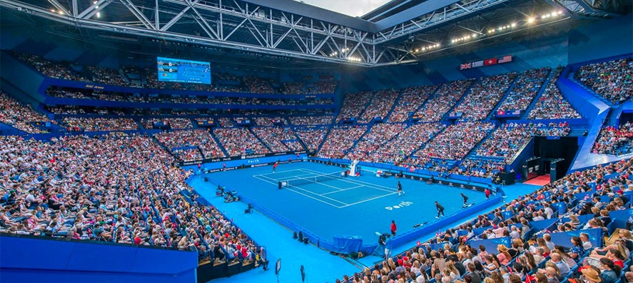 A photo showing a tennis match being played with the roof open at RAC Arena in Perth