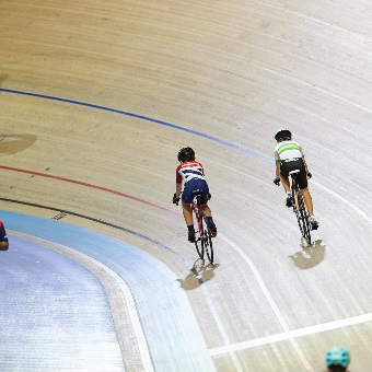 A photo of three cyclists engaging in speed cycle training at the Speeddome in Middle Swan, Perth
