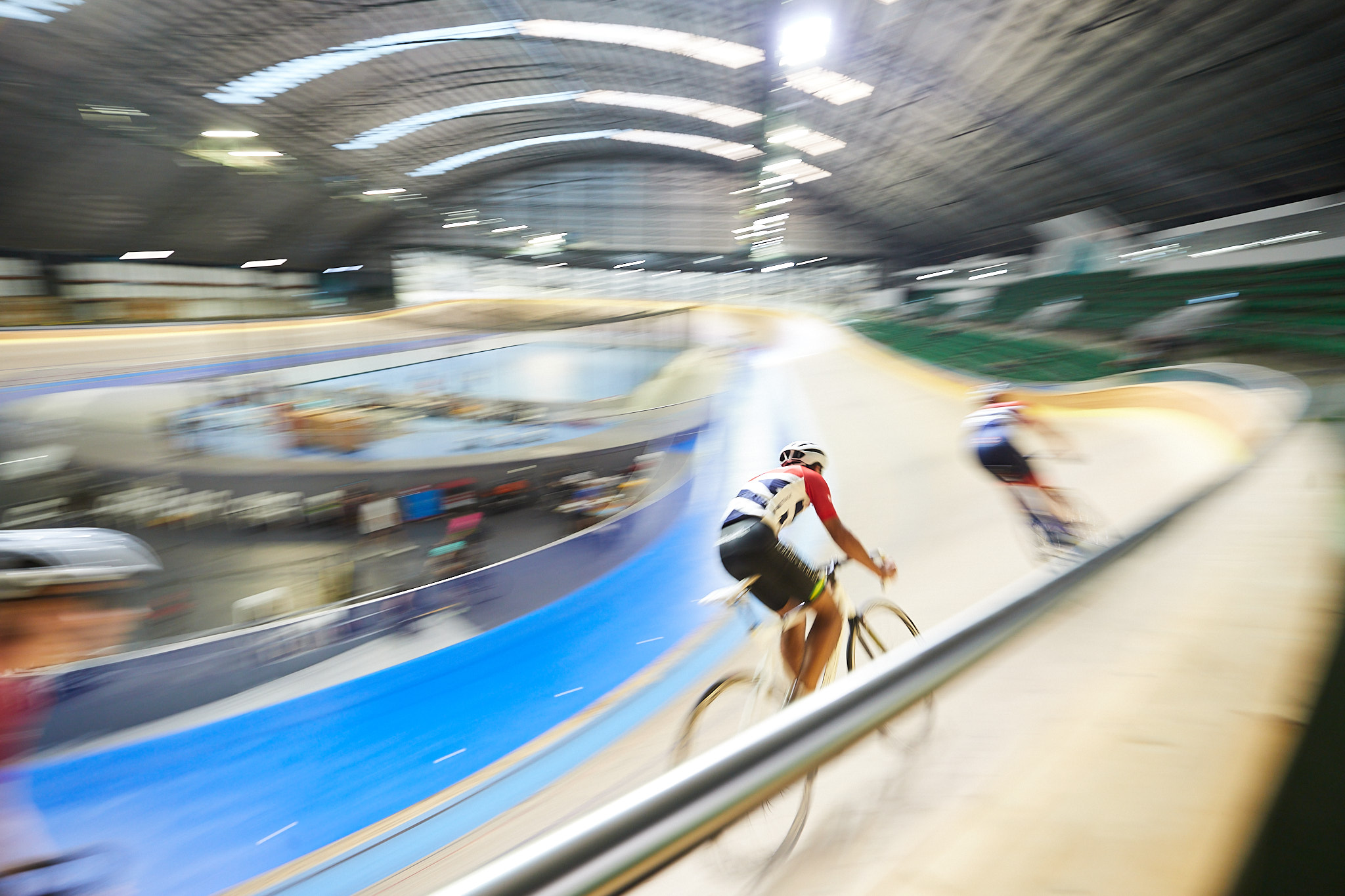 A photo of two cyclists engaging in speed cycle training at the Speeddome in Middle Swan, Perth